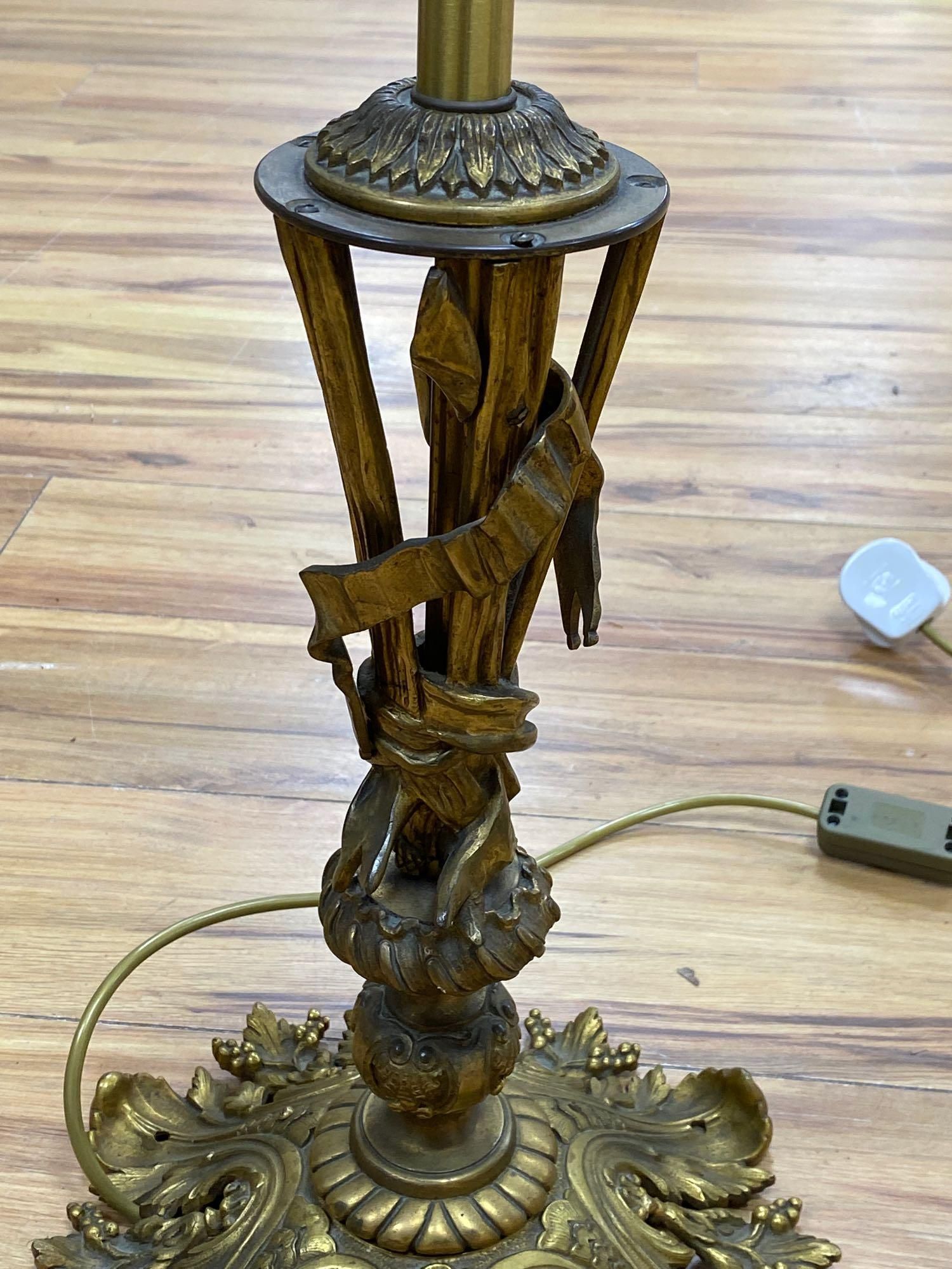 A gilt metal table lamp